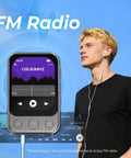 Person using 64GB Clip MP3 Player With Bluetooth 5.3 And Built In Speaker, 2 Inch IPS HD Touchscreen Plus Physical Buttons, FM Radio mode
