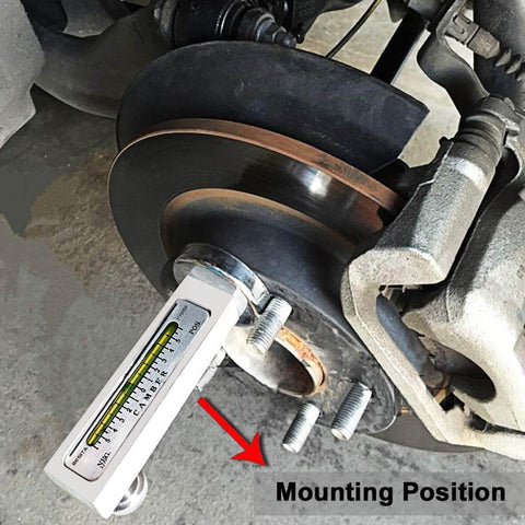Adjustable Magnetic Camber Gauge Tool For Vehicle Suspension And Wheel Alignment mounted on brake disc.