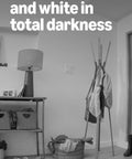 Wireless Indoor Security Camera With Retinal 2K Video And 6X Optical Zoom For Crisp True Color Footage Day Or Night Straight Up Solid Home Safety Monitor Black in total darkness capturing sharp black and white.