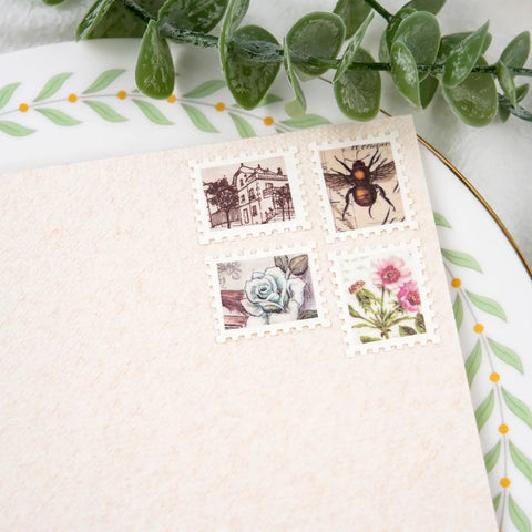 Lever Action Postage Stamp Punch 1x0.8 Inch Rectangular Stamp Shaped Paper Punch for Scrapbooking shown on craft paper