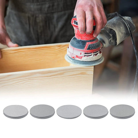 Grab These 50 Pack Super Tough 7 Inch Aluminum Oxide Sanding Discs With Hook Loop Backing And Flocking Design For Smooth Dry Sanding Projects No Clog Needed being used on wood surface.