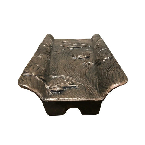 Front view of Cast Aluminum Splash Block In Antique Bronze, Rust Free Yard Drainage Block, detailed textured surface visible