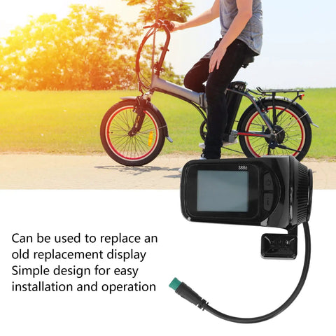Dope Electric Bike LCD Display Meter Kit For Scooters And E Bikes with cable, shown next to a person on a folded bike.