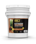 Heavy Duty Wood Stain And Sealer In One For Decks, 5 Gallon Semi Transparent Waterproof Coating In Light Walnut in a white bucket.