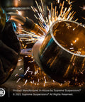 Welding process of a 3.5 Inch Front Suspension Leveling Kit For Ram 2500 And Ram 3500 Trucks, showing steel coil lift spacers.