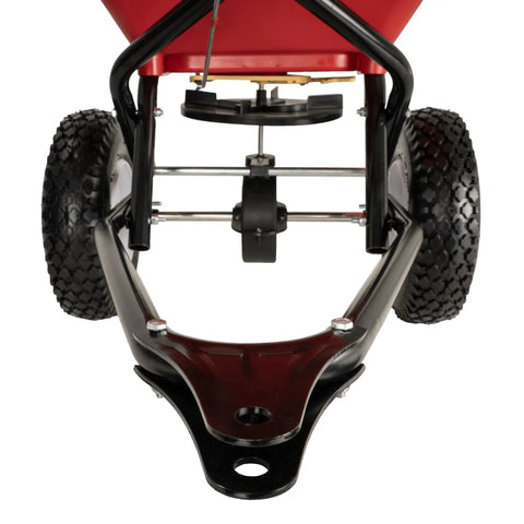 Front view of Tow Behind 150Lb Broadcast Spreader for Fertilizer and Seed with Easy Flow Control Adjustable Settings Non Skid Tires.