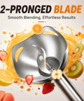 Hella Smooth Corded Immersion Blender With Two Knockout Speeds And A Beefy Copper Motor For Effortless Soup Puree Sauce Blending Paired With Stainless Steel Blades For Zero Fuss Kitchen Prep Magic 2-pronged stainless steel blade surrounded by blended fruits.