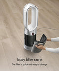Hands changing filter on Hot And Cool HP07 Air Purifier With Heater And Fan, All In One Climate Control, Auto Pollutant Sensor, Fully Sealed HEPA H13