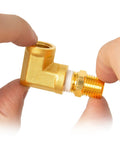 Close-up of Brass Pipe Fitting 90 Degree Barstock Street Elbow Three Eighths Inch NPT Female To Female being held by hands