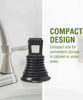 Must Have Mini Bellows Sink Plunger For Kitchens Bathrooms Baths Laundry Tubs And RVs Compact Powerful Clog Clearing Tool With Rubber Cup Easy To Store Portable Great For Quick Drains on a sink ledge next to faucet in kitchen