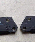 Close-up of RTH RTX tiller tines marked 130079L and 130080L from 44 Piece Tine Replacement Set For RTH RTX Tillers Including 22 RH and 22 LH Tines Replacing 130079L RH And 130080L LH For Durable Farm Tilling And Hard Use