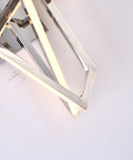 Super Clean Chrome Finish And Bright White Panels Super Sleek Led Wall Sconce That Really Hits Different With Cozy 3000k Glows Easy Install And Solid Build Quality For Any Space, featuring illuminated geometric design.