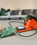 60W LED Display Soldering Station Kit with 2 Helping Hands and PCB board in use on a desktop setup