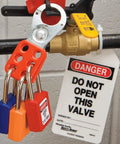 Red Lockout Tagout Safety Padlock With Key For Electrical Work Non Conductive Thermoplastic Body Durable Metal Shackle OSHA Compliant Lockout Tool For Electrical Safety And Safe Repairs 410RED on a valve with danger tag