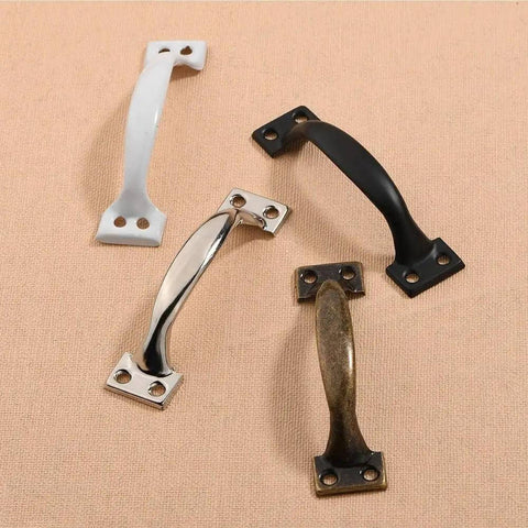 Various vintage door pull handles including Vintage Five Inch Door Pulls 2 Pack Bow Shaped Gate Handles in Red Bronze Finish.