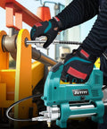 Cordless Grease Gun For Makita 18V Battery, 12000 PSI High Pressure, used on machinery in workshop setting