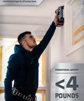 Kickass Cordless Brad Nailer Kit in use for trim work, showcasing lightweight design under 4 pounds, operated by a man.