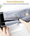 Hella Tough Vacuum Sealer Crushes The Preservation Grind With A Savage 80Kpa Suction, showing external sliding cutter in use.