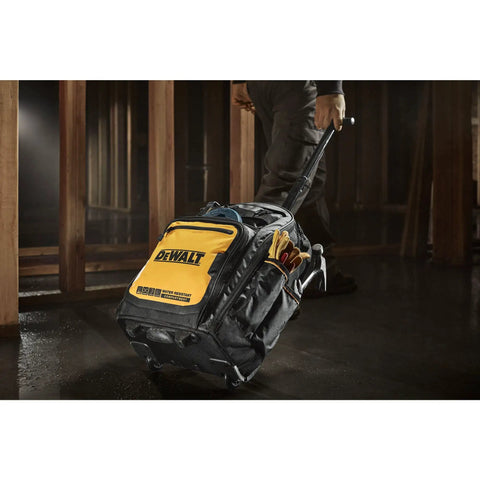 Pro Rolling Tool Backpack On Wheels With IP54 Weatherproof Compartment being wheeled on a construction site