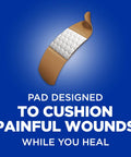 Angled view of Band-Aid flexible fabric adhesive bandage with tan backing and white cushioned pad