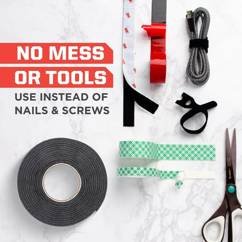 Indoor Double Sided Mounting Tape 1/2 Inch By 80 Inch With Industrial Strength Adhesive, tape roll with tools and accessories on a marble surface.