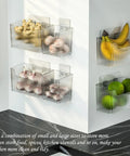 2 Pack Cabinet Door Organizer Wall Mounted Shower Caddy Stackable Plastic Adhesive Organizer For Bathroom Kitchen Pantry Makeup BPA Free Clear Includes Extra Replacement Adhesive Strips For Easy Install, side view with fruits and vegetables.