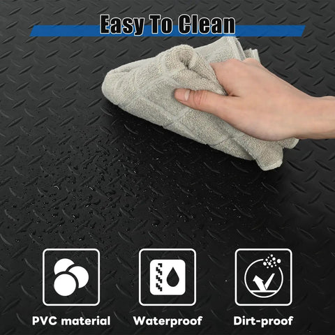 Cleaning a black 3 By 7 Foot Anti Fatigue Floor Mat Extra Thick One Inch For Machinist Shop Garage Standing Pad with cloth.