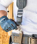 Man adjusting cooling mesh padded tool belt suspenders with heavy duty steel hardware, chest strap, and adjustable fit.