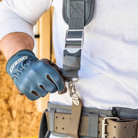 Man adjusting cooling mesh padded tool belt suspenders with heavy duty steel hardware, chest strap, and adjustable fit.