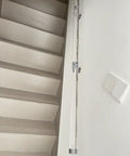 Built Like A Tank Clear Acrylic Stair Railing Kit With Heavy Duty Silver Brackets And Scratch Resistant End Caps For Indoor Outdoor Steps No Sweat Setup Safety Handrail And Modern Balusters 18 Foot Run along light-colored stairs.