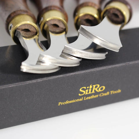Close-up of Leather Edge Creaser Set With Stainless Steel Tips 1.0mm 1.5mm 2.0mm 2.5mm And Wood Handle on box.