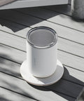 Slick 2 In 1 Self Stirring Heated Coffee Mug With Automatic Mixing And 3 Chill Proof Temp Modes For Coffee Milk Cocoa Protein Shakes 300 Ml Stainless Steel on a wooden table.