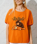 Cute Babys Monkey Punchs Team DTF Transfers 7x7 Inches on orange shirt with cartoon design and 'Be Kind' text