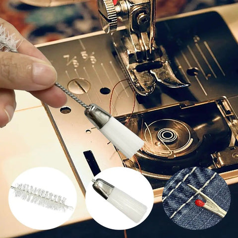 All In One Sewing Machine Cleaning Kit with tweezers and double-headed brush next to sewing machine components