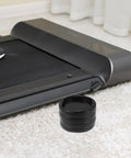 Shock Absorbing Floor Pads For Home Gym 4 Pack Non Slip Base Mats for treadmills shown on carpeted floor