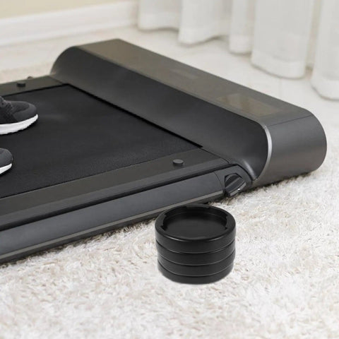 Shock Absorbing Floor Pads For Home Gym 4 Pack Non Slip Base Mats for treadmills shown on carpeted floor