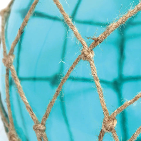 Close-up of blue glass shade with natural rope netting on Netted Buoy Coastal Sea Glass Pendant Light With Natural Rope Clear Glass Shade Brushed Nickel Finish Adjustable 54 Inch Hanging Length Ideal Over Kitchen Island Or Dining Table Nautical Vibe Home Decor