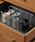 Top Shelf Crystal Clear Acrylic Belt Organizer With Removable Dividers Stackable Storage Bin for ties and watches in drawer.