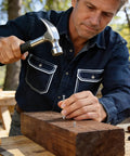 Man hammering nail into wood using the 510 Piece Stainless Steel Nails Kit With 7 Sizes For Woodworking Fencing Furniture And DIY Projects