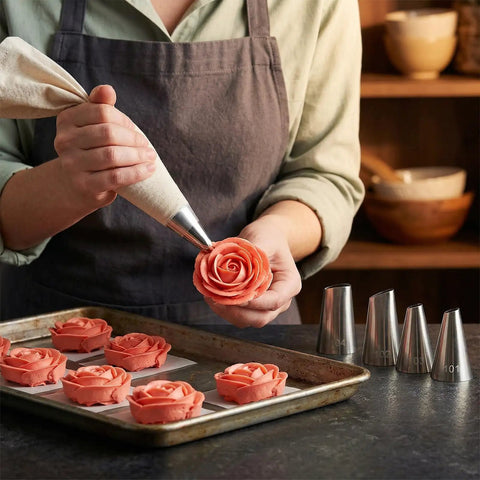 Baker using 4 Piece Flower Piping Tips Set For Cake Decorating Pro Grade Stainless Steel Petal Icing Tips 101 102 103 104