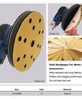 Grab These Killer Yellow 6 Inch Gold Sanding Discs With Anti-Clog Coating And 15 Holes For Dust Free Grinding On Any Project That Hits Hard Today close-up view of sanding disc with 15 holes.