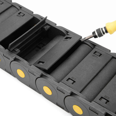 R55 25mm By 77mm Plastic Cable Drag Chain with open cover, showing internal structure for robotics CNC use, screwdriver adjusting