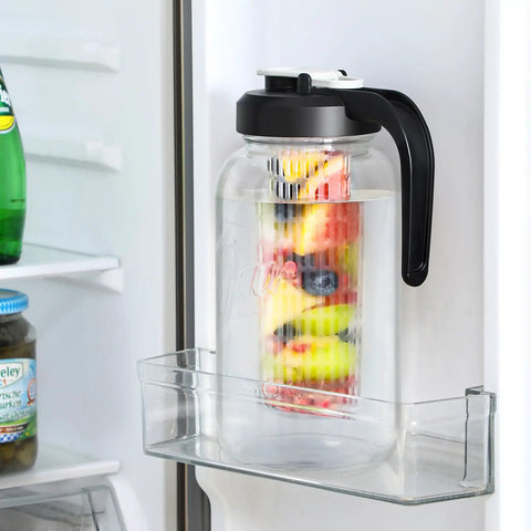 Fruit Infuser Glass Water Pitcher With Wide Mouth 2 Quart Leakproof No Spill Mason Style Jar in refrigerator with fruit slices
