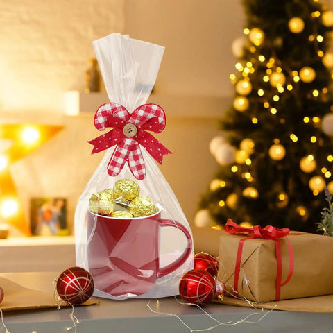 Flat Bottom Cellophane Bags 7x3x12 Inches Clear Treat Bags For Cookies, 100 Pieces With Twist Ties wrapped around a mug.