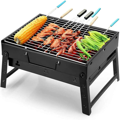 Portable Folding Charcoal Grill For Outdoor BBQ On The Go Stainless Steel Tabletop Smoker with food grilling on skewers.