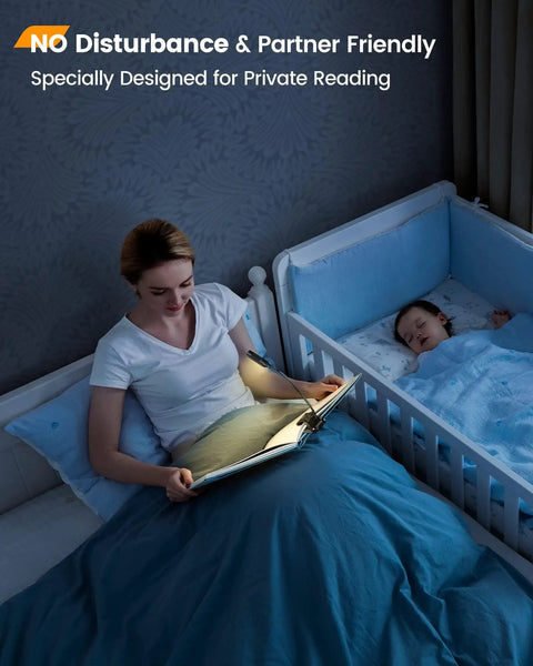 Person using Willow LED Reading Light For Bedtime, 10 LED bright reading lamp in bed, child sleeping nearby, no disturbance.