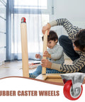Six Pack Of Two Inch Rigid Rubber Casters With Steel Mounting Plate Heavy Duty Silent Rolling Wheels For Furniture Cart Workbench Smooth No Sweat Installation Process, shown during assembly.