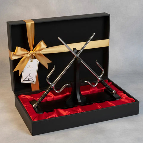 Dope Dual Blade Display Stand For Sai And Kama in gift box with black wood vertical holder, satin lining, and gold ribbon.