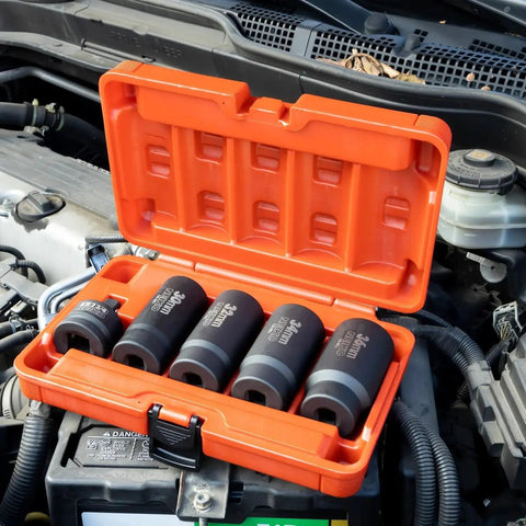 Heavy Duty 5 Piece 12 Point Socket Set 1/2 Drive for Axle Nut and Lug Nut Removal displayed in open orange case on engine