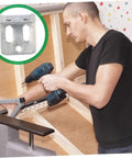 Person using drill to install thickened sofa spring clips, highlighting 100 piece set for quick couch fixes and upholstery support.